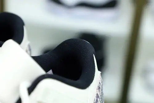 Air Jordan 11 Low Snakeskin Light Bone 